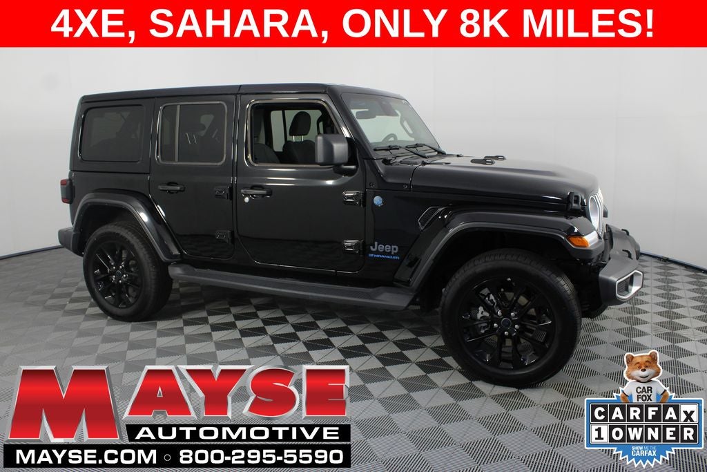 2025 Jeep Wrangler Sahara 4xe in Black Clearcoat — front three-quarter view