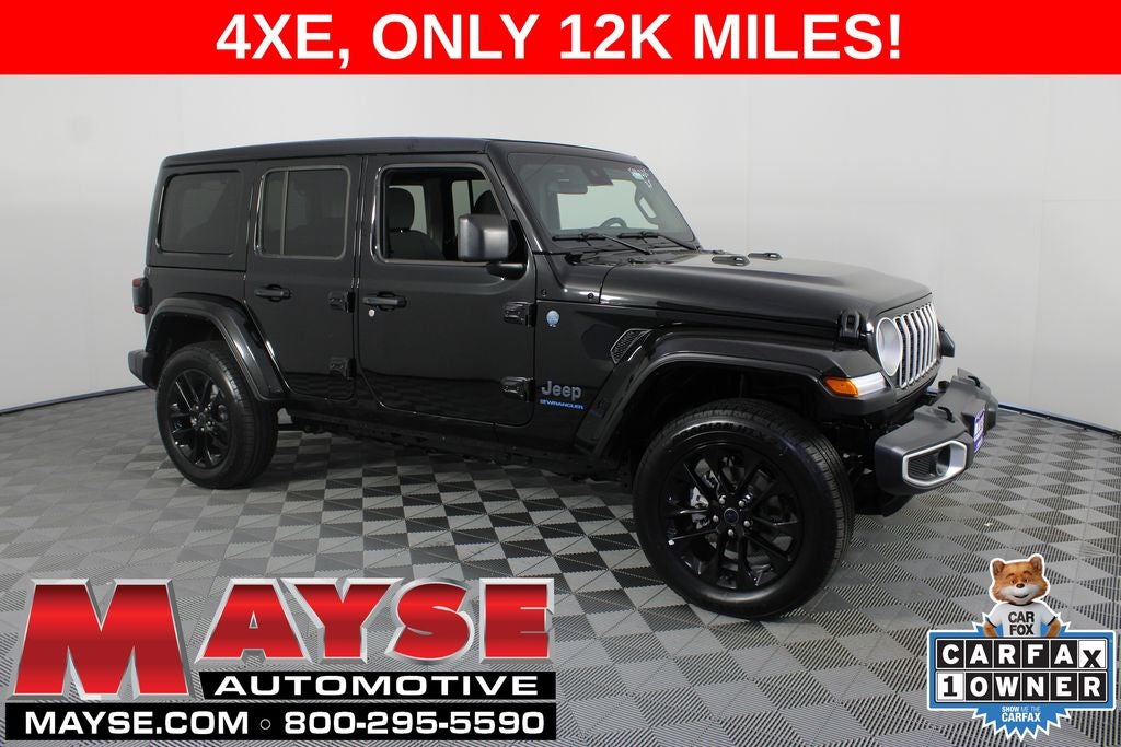 2025 Jeep Wrangler Sahara 4xe in Black Clearcoat — front three-quarter view
