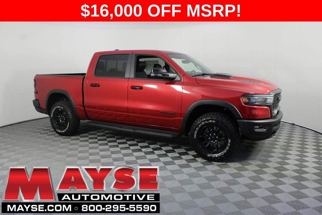 2026 RAM 1500 Rebel in Molten Red Pearl-Coat Exterior Paint — front three-quarter view
