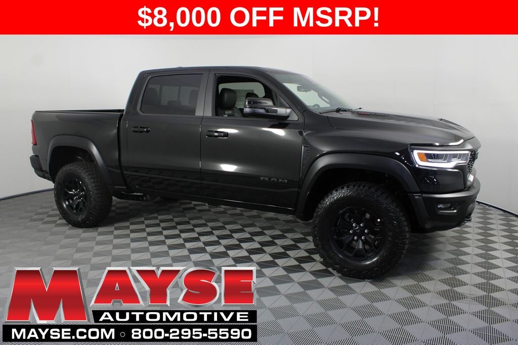 2026 RAM 1500 RHO in Diamond Black Crystal Pearl-Coat Exterior Paint — front three-quarter view