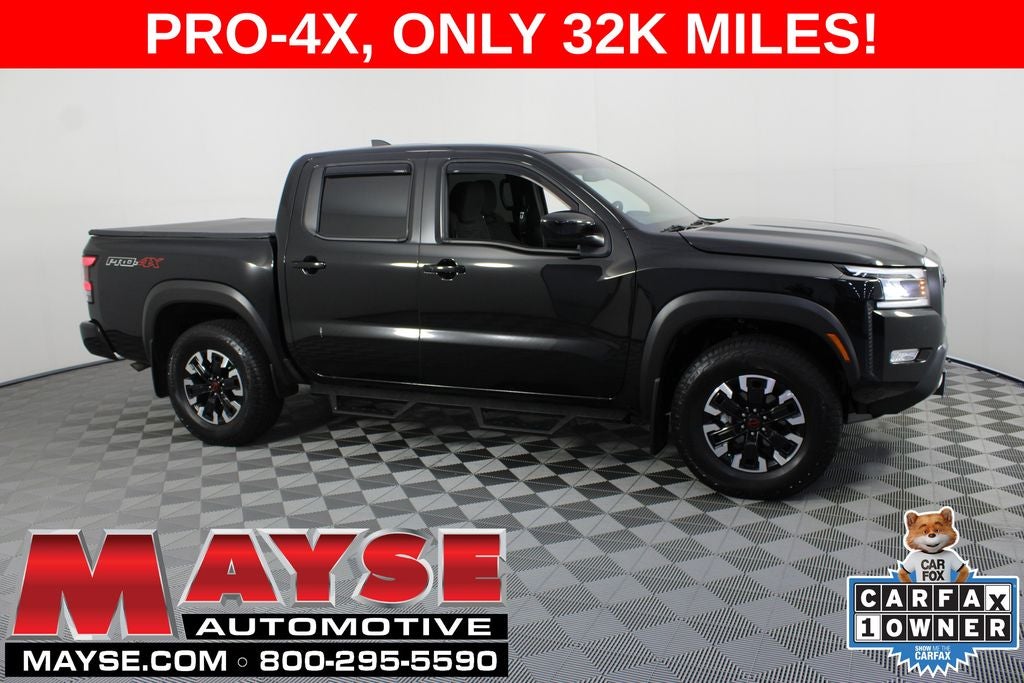 2024 Nissan Frontier PRO-4X in Super Black — front three-quarter view