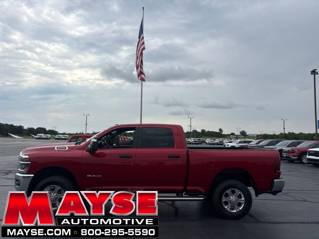 2026 RAM 2500 Big Horn in Molten Red Pearlcoat — front three-quarter view