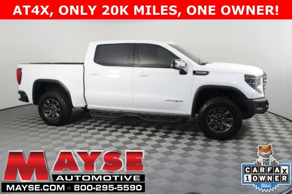 2025 GMC Sierra 1500 AT4X in Summit White — front three-quarter view
